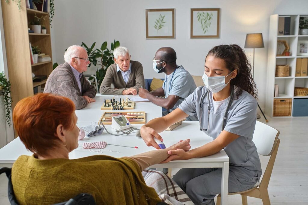 nurse-holding-medical-exam-for-senior-people-FC3WXYW.jpg